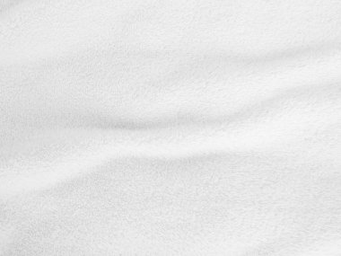 White clean wool texture background. light natural sheep wool. white seamless cotton. texture of fluffy fur for designers. close-up fragment white wool carpet.	