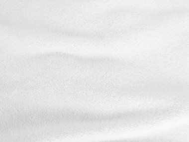 White clean wool texture background. light natural sheep wool. white seamless cotton. texture of fluffy fur for designers. close-up fragment white wool carpet.	