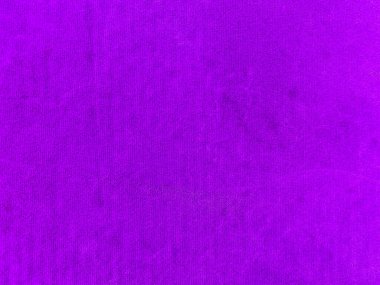 Purple velvet fabric texture used as background. Empty purple fabric background of soft and smooth textile material. There is space for text....	