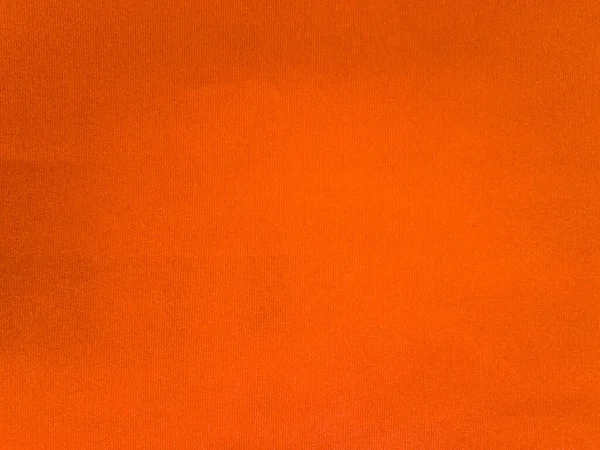 橙色天鹅绒面料质地为背景 清澈的橙色面料背景 柔软而光滑的纺织材料 文本是有空间的 — 图库照片