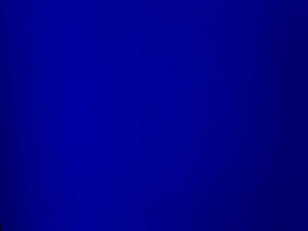 背景にブルーベルベット生地のテクスチャ 柔らかく滑らかな繊維素材の空の青い生地の背景 テキストのスペースがあります — ストック写真