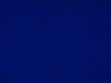 Arka plan olarak mavi kadife kumaş dokusu kullanılıyor. Yumuşak ve pürüzsüz tekstil malzemelerinin boş mavi kumaş arka planı. Metin için boşluk var.