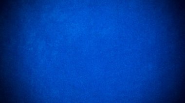 Arka plan olarak kullanılan koyu mavi kadife kumaş dokusu. Yumuşak ve pürüzsüz tekstil malzemelerinden oluşan boş mavi kumaş arkaplan. Metin için boşluk var.