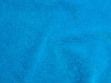 Light blue velvet fabric texture used as background. Empty light blue fabric background of soft and smooth textile material. There is space for text..	