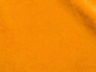 Yellow velvet fabric texture used as background. Empty yellow fabric background of soft and smooth textile material. There is space for text..	