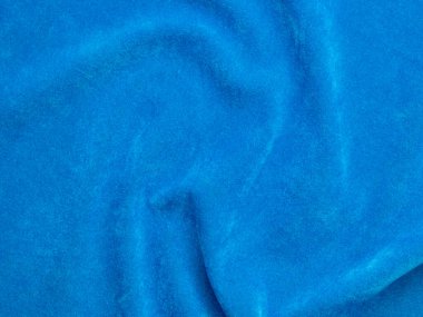 Light blue velvet fabric texture used as background. Empty light blue fabric background of soft and smooth textile material. There is space for text..	