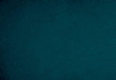 Arka plan olarak kullanılan koyu mavi kadife kumaş dokusu. Yumuşak ve pürüzsüz tekstil malzemesinin ton rengi mavi kumaş arka planı. Metin ve tüm tasarım işleri için yer var