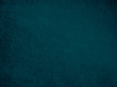 Arka plan olarak kullanılan koyu mavi kadife kumaş dokusu. Yumuşak ve pürüzsüz tekstil malzemesinin ton rengi mavi kumaş arka planı. Metin ve tüm tasarım işleri için yer var