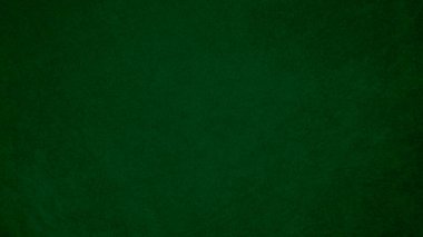 Açık yeşil kadife kumaş dokusu arka plan olarak kullanılır. Yumuşak ve pürüzsüz tekstil malzemesinin ton rengi yeşil kumaş arka planı. Metin ve tüm tasarım işleri için yer var