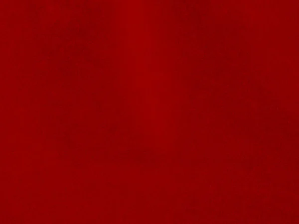 背景として使用される赤いベルベット生地のテクスチャ 柔らかく滑らかな繊維素材の空の赤い生地の背景 テキストのスペースがあります — ストック写真