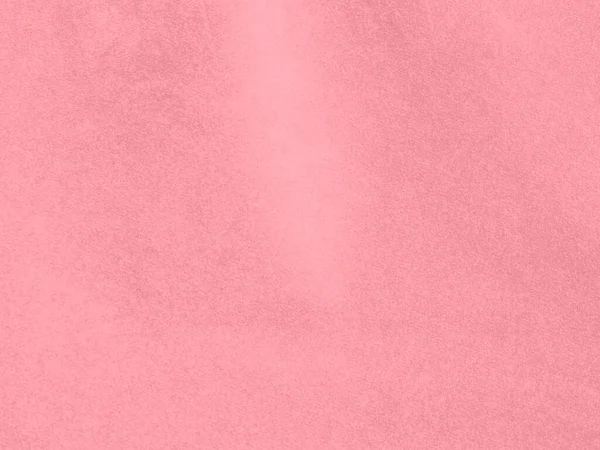 rose gold color velvet fabric texture used as background. Empty pink gold fabric background of soft and smooth textile material. There is space for text..