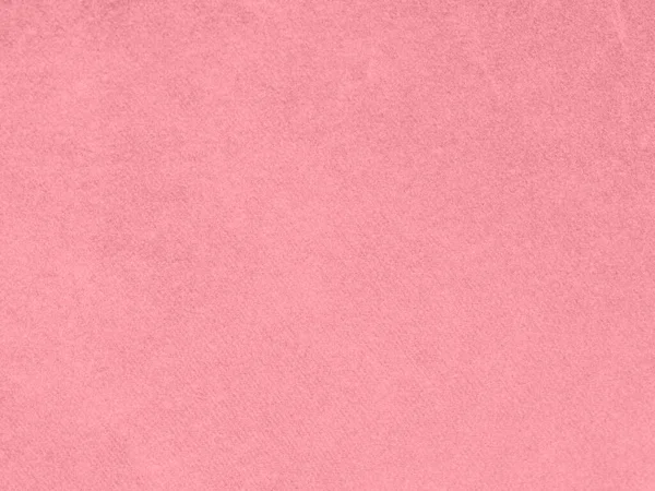 rose gold color velvet fabric texture used as background. Empty pink gold fabric background of soft and smooth textile material. There is space for text..