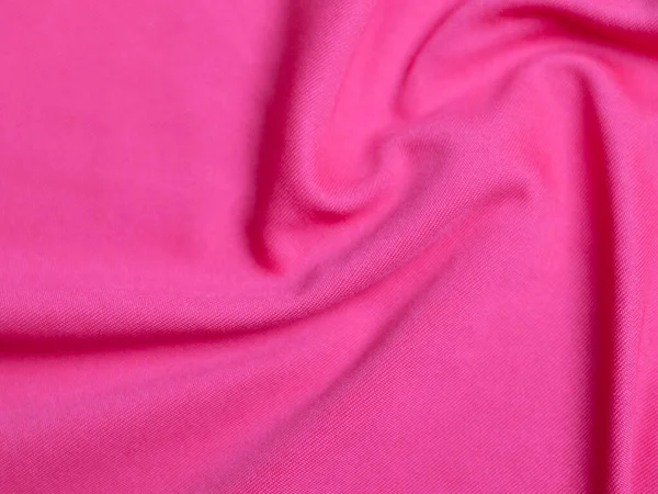 Pink velvet fabric texture used as background. Empty pink  fabric background of soft and smooth textile material. There is space for tex