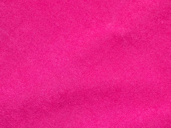 Pink velvet fabric texture used as background. Empty pink  fabric background of soft and smooth textile material. There is space for tex