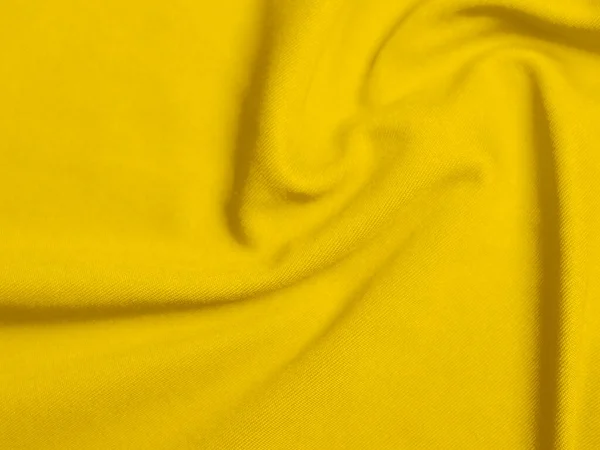 背景に使われる黄色のベルベット生地の質感 柔らかく滑らかな繊維素材の空の黄色の生地の背景 テックスのためのスペースがあります — ストック写真