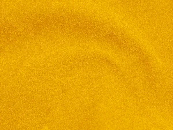 背景に使われる黄色のベルベット生地の質感 柔らかく滑らかな繊維素材の空の黄色の生地の背景 テックスのためのスペースがあります — ストック写真