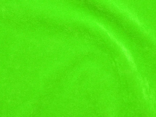 背景には薄緑色のベルベット生地を使用 柔らかく滑らかな繊維素材の空の緑の生地の背景 テキストのスペースがあります — ストック写真