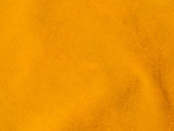 Yellow velvet fabric texture used as background. Empty yellow fabric background of soft and smooth textile material. There is space for text..	