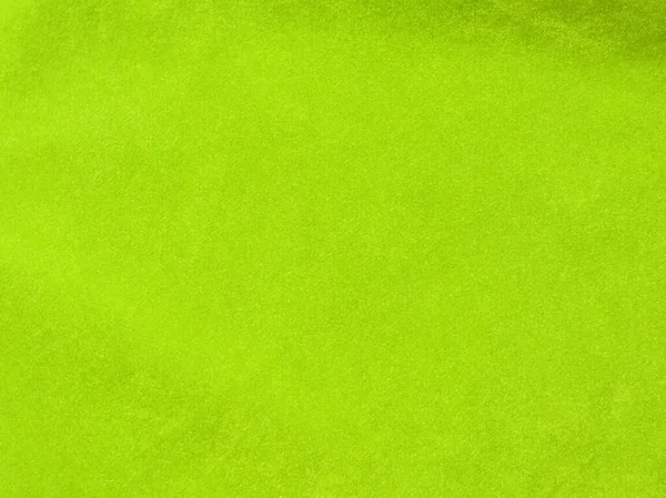 背景には薄緑色のベルベット生地を使用 柔らかく滑らかな繊維素材の空の緑の生地の背景 テキストのスペースがあります — ストック写真