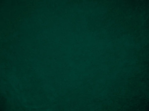 背景には濃緑色のベルベット生地を使用 柔らかく滑らかな繊維素材のトーンカラー緑の布の背景 テキストとあらゆる種類のデザイン作品のためのスペースがあります — ストック写真