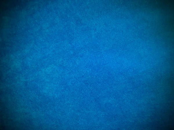 Light blue velvet fabric texture used as background. Tone color blue cloth  background of soft and smooth textile material. There is space for text and for all types of design work