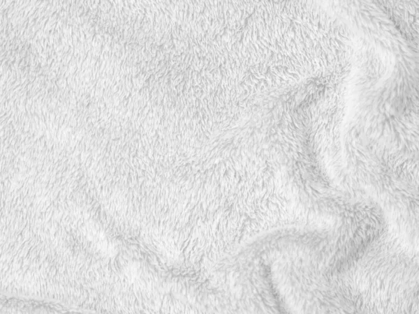 White clean wool texture background. light natural sheep wool. white seamless cotton. texture of fluffy fur for designers. close-up fragment white wool carpet.