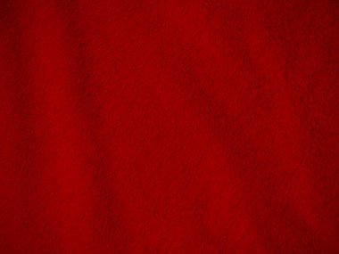 Kırmızı, temiz yün dokusu arka plan. hafif doğal koyun yünü. Serge dikişsiz pamuk. Tasarımcılar için tüylü kürk dokusu. Yakın plan kırmızı yün halı..