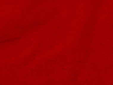 Kırmızı, temiz yün dokusu arka plan. hafif doğal koyun yünü. Serge dikişsiz pamuk. Tasarımcılar için tüylü kürk dokusu. Yakın plan kırmızı yün halı..