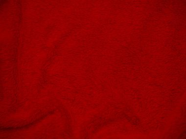 Kırmızı, temiz yün dokusu arka plan. hafif doğal koyun yünü. Serge dikişsiz pamuk. Tasarımcılar için tüylü kürk dokusu. Yakın plan kırmızı yün halı..