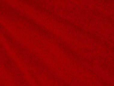 Kırmızı, temiz yün dokusu arka plan. hafif doğal koyun yünü. Serge dikişsiz pamuk. Tasarımcılar için tüylü kürk dokusu. Yakın plan kırmızı yün halı..