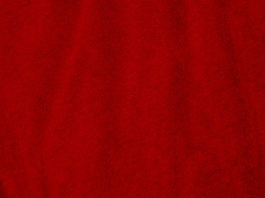 Kırmızı, temiz yün dokusu arka plan. hafif doğal koyun yünü. Serge dikişsiz pamuk. Tasarımcılar için tüylü kürk dokusu. Yakın plan kırmızı yün halı..