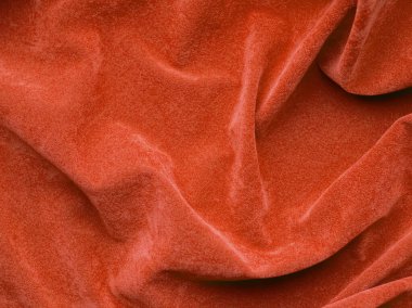 Orange velvet fabric texture used as background. Empty Orange fabric background of soft and smooth textile material. There is space for text..	
