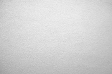 Felt white soft rough textile material background texture close up, felting and frieze poker table,tennis ball,table cloth. Empty white fabric background.	