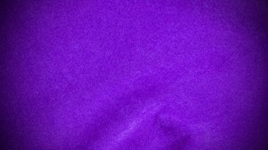 Arka plan olarak kullanılan mor kadife kumaş dokusu. Yumuşak ve pürüzsüz tekstil malzemelerinin boş mor kumaş arkaplanı. Metin için boşluk var.