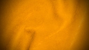 Yellow velvet fabric texture used as background. Empty yellow fabric background of soft and smooth textile material. There is space for text..	