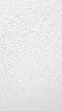 vertical Seamless texture of white cement wall a rough surface, with space for text, for a background.	