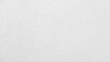 Seamless texture of white cement wall a rough surface, with space for text, for a background.	