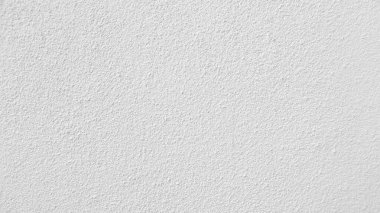 Seamless texture of white cement wall a rough surface, with space for text, for a background.	