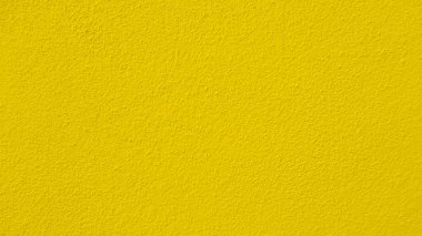 Seamless texture of yellow cement wall a rough surface, with space for text, for a background.	