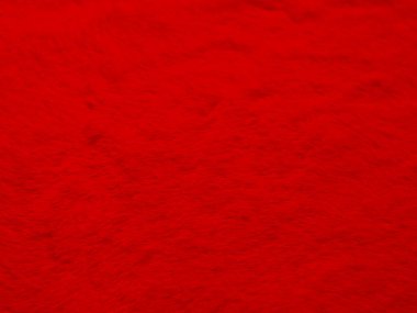 Red clean wool texture background. light natural sheep wool. blanket seamless cotton. texture of fluffy fur for designers. Fragment red serge carpet.Tweed haircloth.	