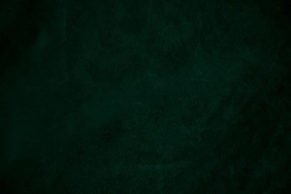 stock image Dark green old velvet fabric texture used as background. Empty green fabric background of soft and smooth textile material. There is space for text..	