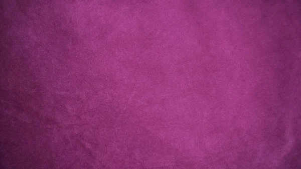 背景として使われるピンクベルベット生地の質感 柔らかく滑らかな繊維素材の空のピンクの生地の背景 テキストのスペースがあります — ストック写真