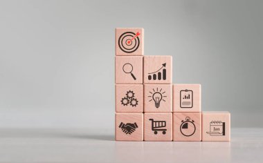 Dart board, conceptualization to lead to the right goal. cube block to contain the purpose of doing business overcoming challenges Walking towards goals and winning,	