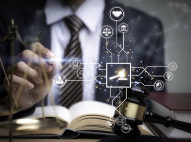 Justice lawyers with Judge gavel, Businessman in suit or lawyer Hiring lawyers in the digital system. Legal law, prosecution, legal adviser, lawsuit, detective, investigation,legal consultant..	
