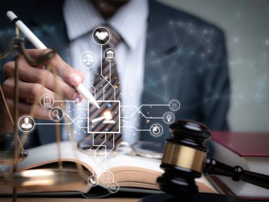 Justice lawyers with Judge gavel, Businessman in suit or lawyer Hiring lawyers in the digital system. Legal law, prosecution, legal adviser, lawsuit, detective, investigation,legal consultant..	