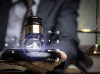 Justice lawyers with Judge gavel, Businessman in suit or lawyer Hiring lawyers in the digital system. Legal law, prosecution, legal adviser, lawsuit, detective, investigation,legal consultant..	