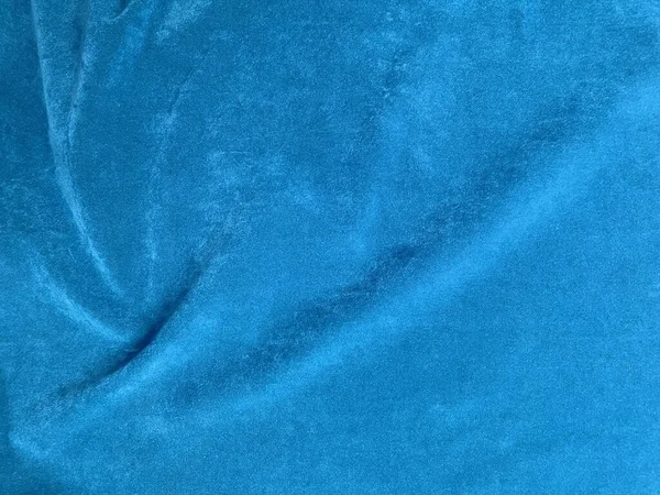 背景には薄青のベルベット生地を使用 柔らかく滑らかな繊維素材の空のライトブルー生地の背景 テキストのスペースがあります — ストック写真