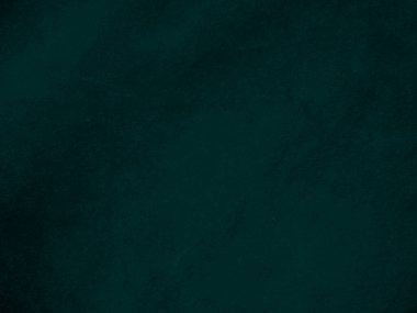 Dark green old velvet fabric texture used as background. Empty green fabric background of soft and smooth textile material. There is space for text..	