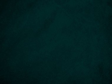 Dark green old velvet fabric texture used as background. Empty green fabric background of soft and smooth textile material. There is space for text..	