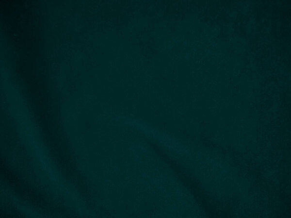 Dark green old velvet fabric texture used as background. Empty green fabric background of soft and smooth textile material. There is space for text..	